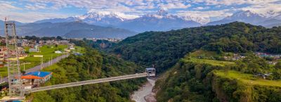 Bungee jumper diving off the cantilever bridge over the Seti Gorge in Pokhara, Nepal